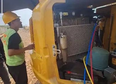 Inspeksi sistem pendingin alat berat